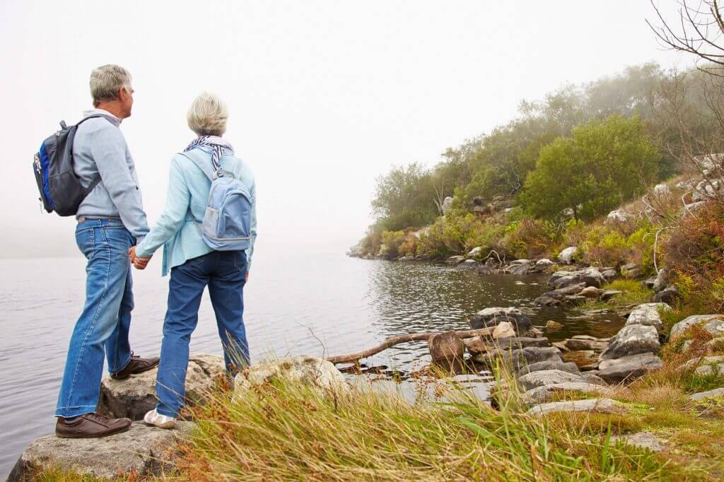 elderly couple at lake